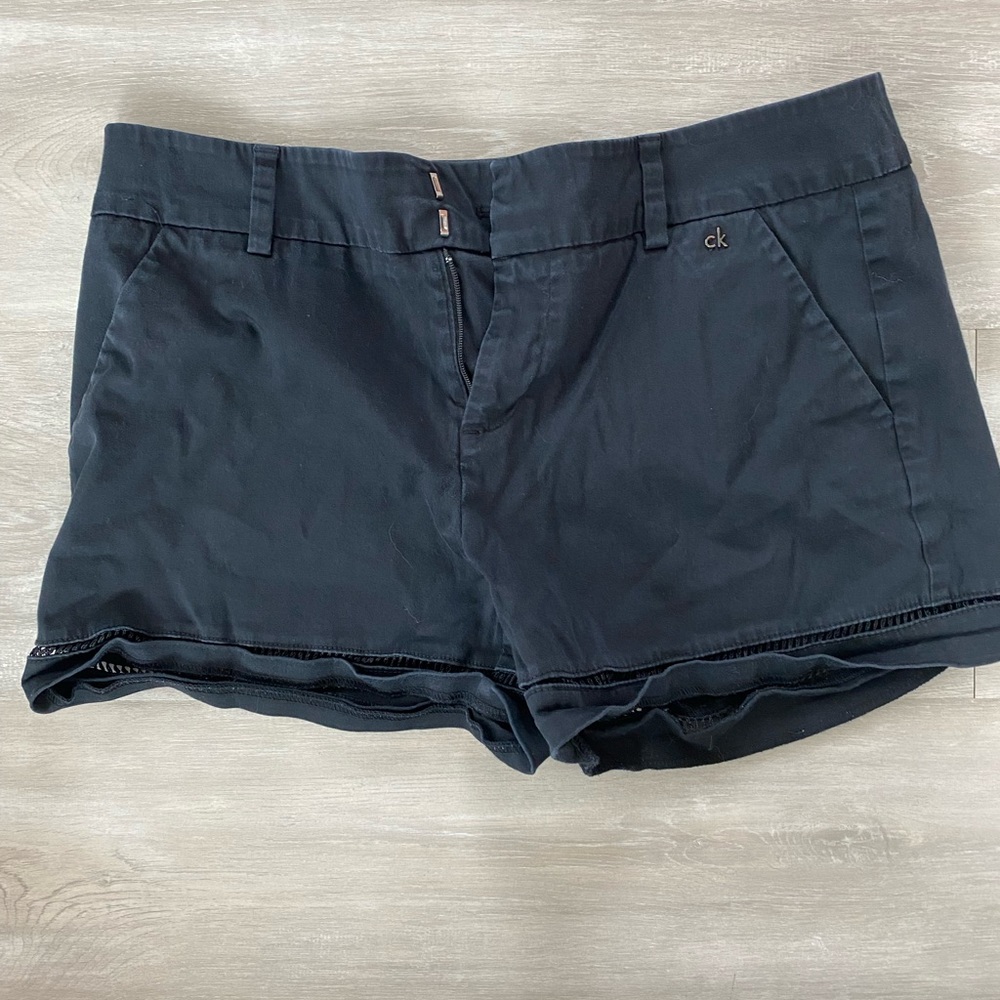Black Calvin Klein shorts. Mid rise 3” inseam